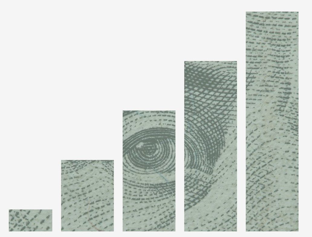 A bar chart showing increasing wealth over time using US dollar bill textures